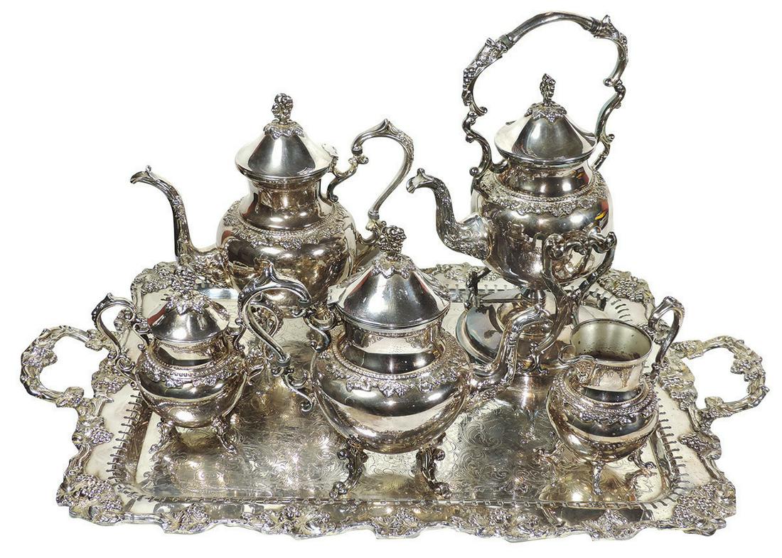 Decorative Tea & Coffee Service, 7-piece Birmingham: Decorative Tea & Coffee Service, 7-piece Birmingham Silverplate, mid 20th Century w/grape & cable decoration, comprising a hot water kettle on warming base, coffee pot, tea pot, creamer, sugar & handl