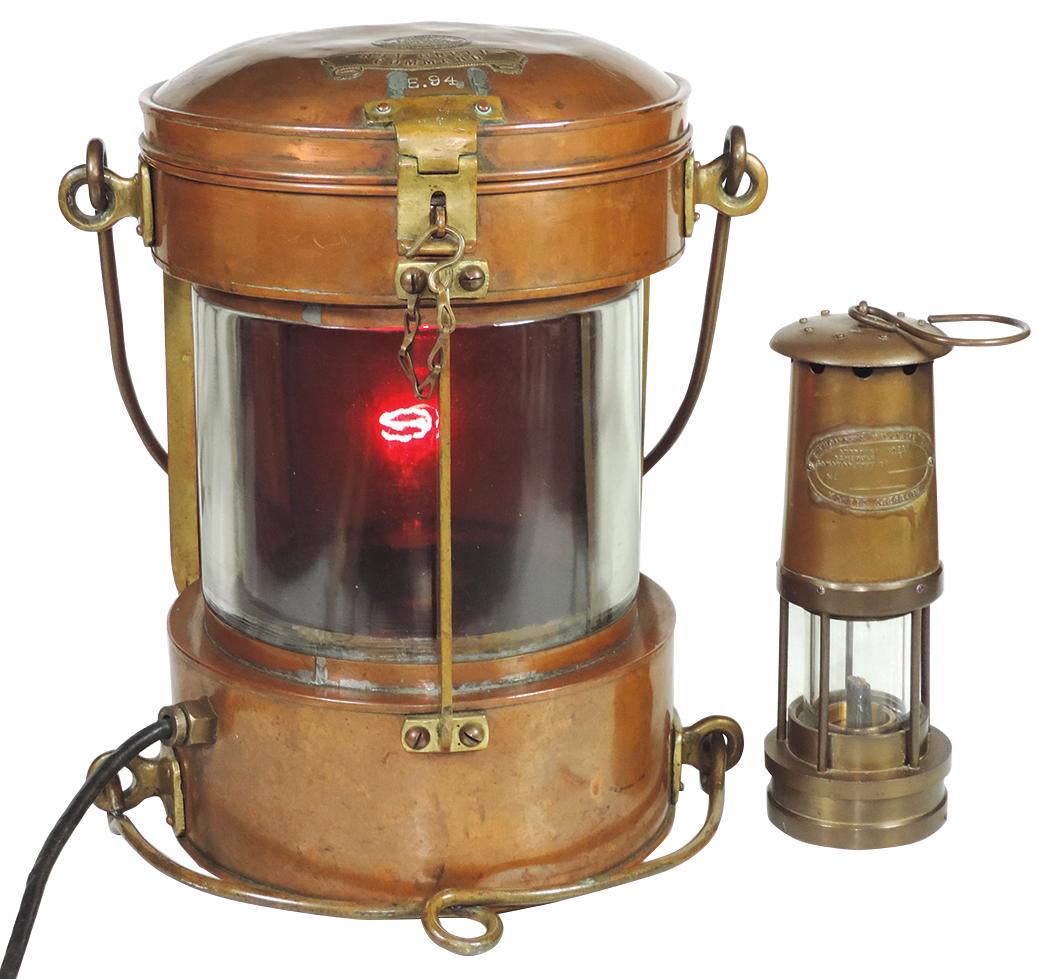 Nautical & Miner Lighting (2), large Hugh Douglas: Nautical & Miner Lighting (2), large Hugh Douglas Navigational brass & glass port lamp tagged "Not Under Command" & "E94" & a brass Thomas & Williams Cambrian miner's lamp, VG cond, 15"H x 11"Dia, coa