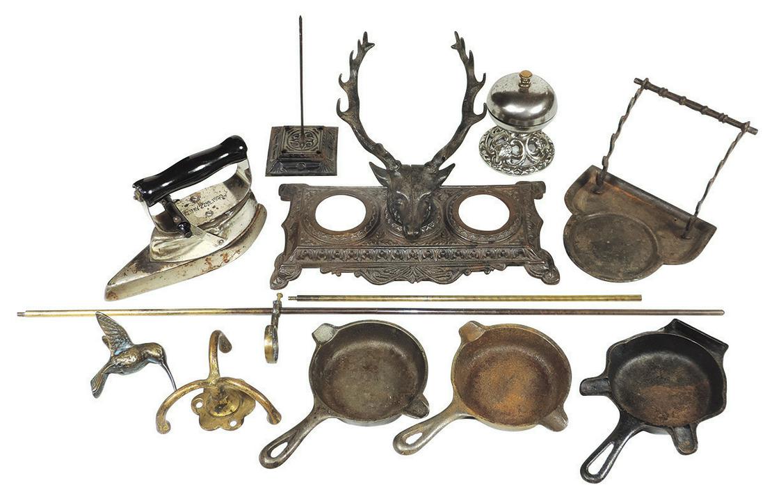 Victorian Cast Iron Grouping (8), figural elks head: Victorian Cast Iron Grouping (8), figural elks head inkstand (sans wells), bill spike, call bell, sad iron, Griswold & Wagner ashtrays & others, together w/a bronze suspension rod w/humming bird finia