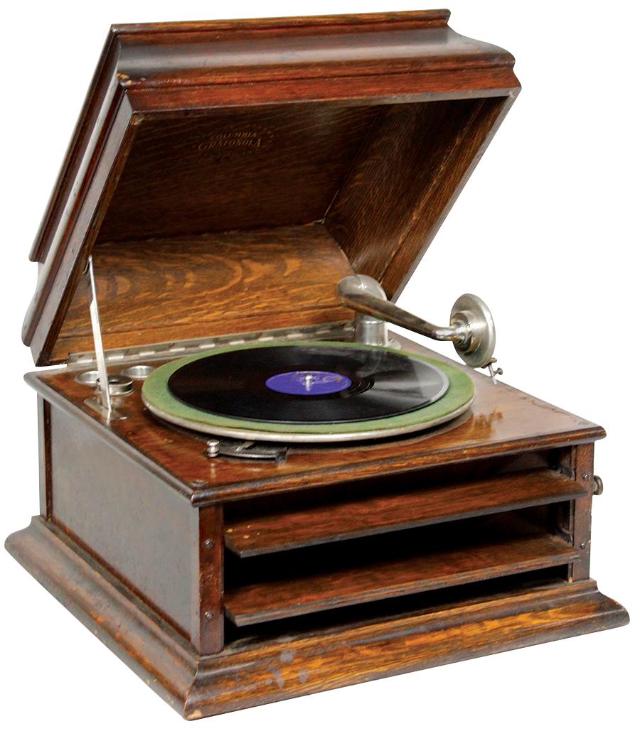 Musical, Phonograph, Columbia Grafonola, windup disc: Musical, Phonograph, Columbia Grafonola, windup disc player in oak case w/shuttered volume control, VG working cond w/orig finish, 12"H x 17"Sq.
