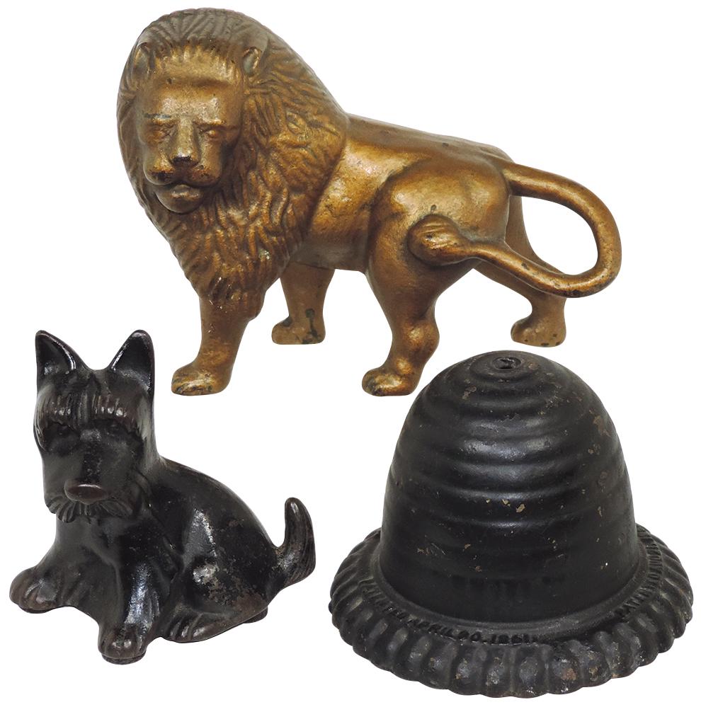 Victorian Cast Iron (3), full bodied lion & terrier: Victorian Cast Iron (3), full bodied lion & terrier doorstops & a Beehive string holder, Pat. 1861, all VG to Exc cond w/orig finishes, largest 10"H x 7"W x 4"D.
