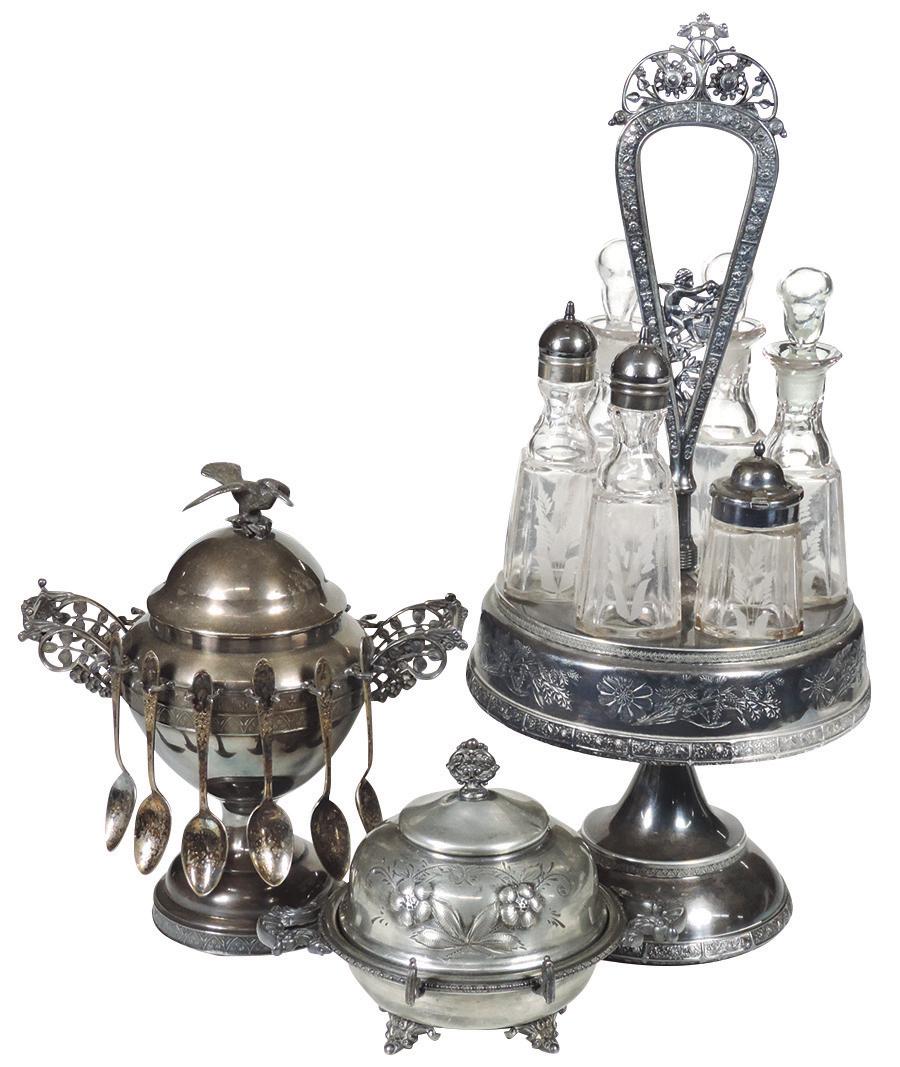 Victorian Table Setting Items (3), 6-bottle castor set: Victorian Table Setting Items (3), 6-bottle castor set in "Meriden" silver-plated frame w/cupid handle, sugar castor w/hummingbird finial & butter dish w/glass insert, VG cond noting knife & 6 spoons