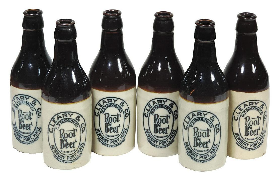 Advertising Stoneware Root Beer bottles (6), all C.: Advertising Stoneware Root Beer bottles (6), all C. Leary & Co. Root Beer, 8 oz bottles from Newbury Port-Mass, all in Exc cond & 8"H.