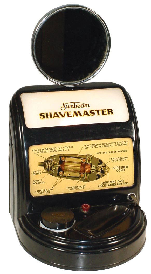 Sunbeam Shavemaster, light-up Deco-style counter: Sunbeam Shavemaster, light-up Deco-style counter display, black plastic w/glass inserts, no razor, o/wise VG cond, 17"H x 9.5"W.