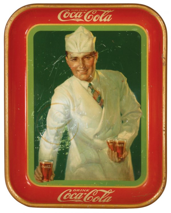 Coca-Cola serving tray, c.1928 Fountain Sales w/S: Coca-Cola serving tray, c.1928 Fountain Sales w/Soda Jerk, American Art Works, Coshocton, O., a Rare tray in Good cond w/some scratches & circle stain, 13"H x 10.5"W.