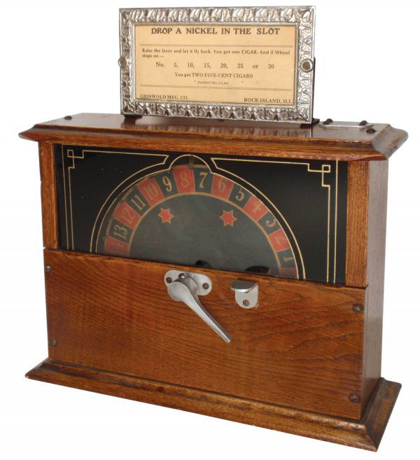 Coin-operated cigar store trade stimulator, Grisw: Coin-operated cigar store trade stimulator, Griswold Wheel of Fortune, mfgd by Griswold Mfg Co.-Rock Island, Ill., c.1905, oak case w/glass face & paper dial, you always got one cigar for your nickel