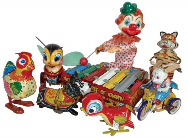 Toys (7), 6 are tin windups, Honey Bee, 5.5"H, Ex: Toys (7), 6 are tin windups, Honey Bee, 5.5"H, Exc cond, Funny Tiger, cloth coat has tear, not working, 7"H, Hen, mfgd by Yone, Exc working cond, 6"H, Wee Scottie, mfgd by Marx w/moving front legs, Ex