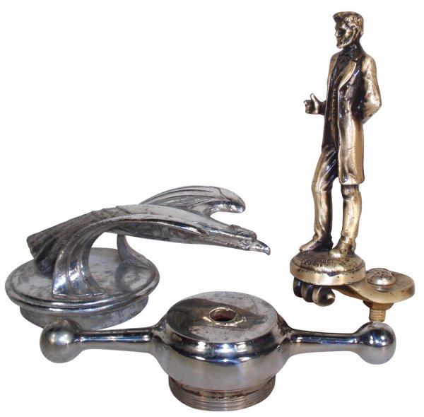 Automobile hood ornaments (3), Abraham Lincoln, m: Automobile hood ornaments (3), Abraham Lincoln, marked Lebarrick Byron II, c.1927, oxidized nickel finish, Exc cond, 6"H, chrome-plated Eagle w/radiator cap, some chrome loss, 3"H & chrome-plated radi