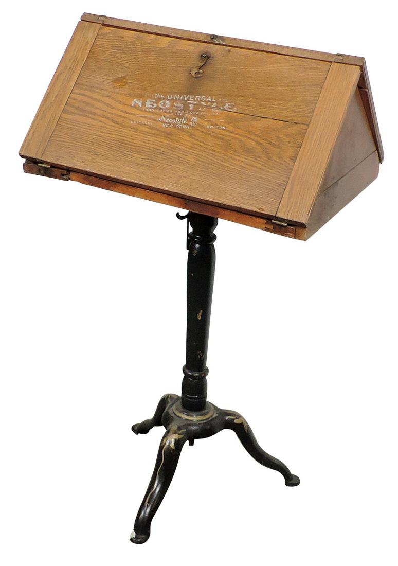 Office Machine, Universal "Neostyle" Duplicator, oak on: Office Machine, Universal "Neostyle" Duplicator, oak on iron stand, mfgd by Neostyle Co., c.1885, triangular cabinet opening on each side serving as a table w/hectograph apparatus, Good cond overall w