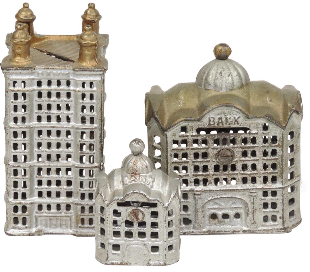 Still Banks (3), small & large Domed Banks & Skyscraper: Still Banks (3), small & large Domed Banks & Skyscraper Bank w/4 posts, all mfgd by A.C. Williams & early 1900s, all cast iron in Exc cond, 3" to 5.5"H.