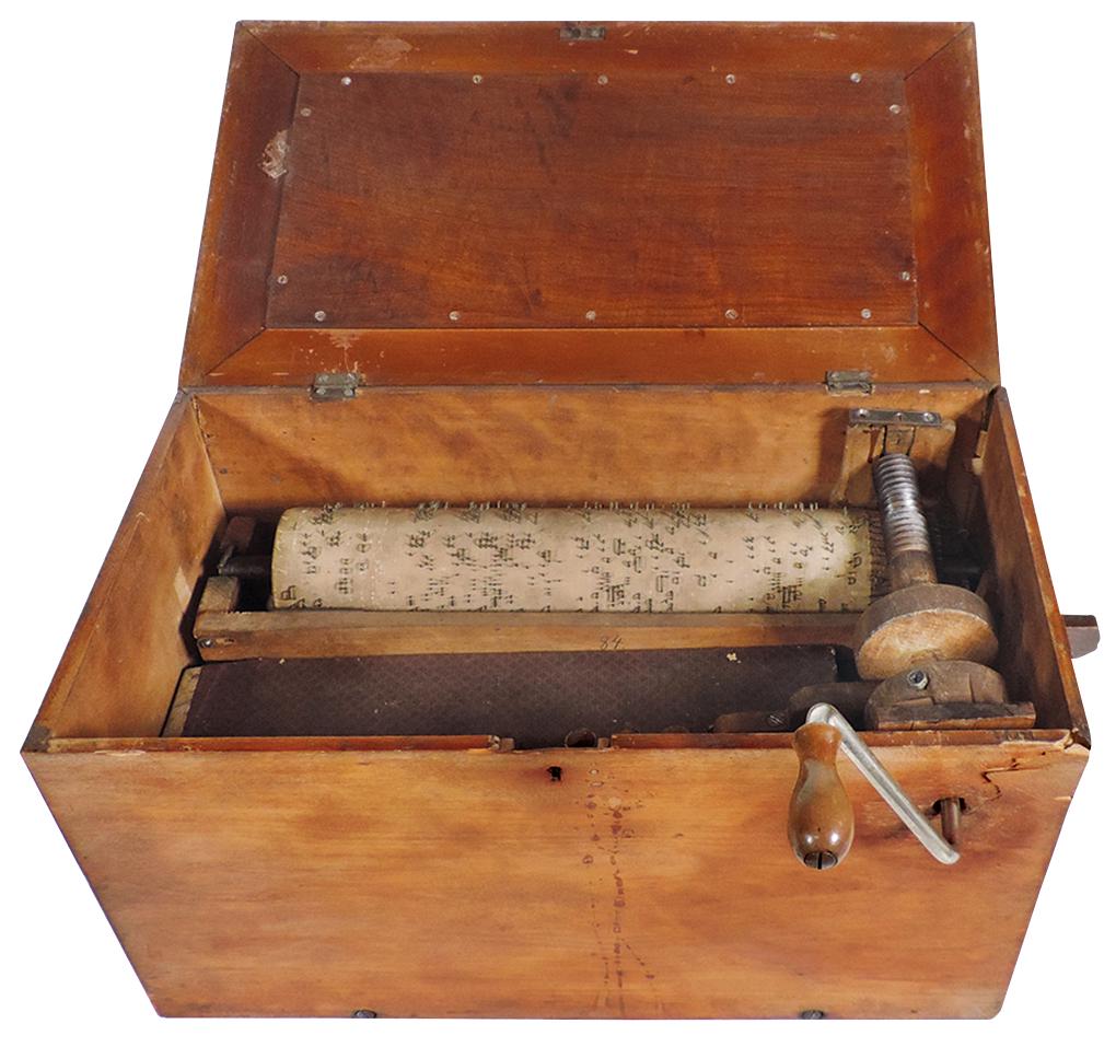 Musical Instrument, roller organ, mahogany-cased,: Musical Instrument, roller organ, mahogany-cased, probably German, c.1850s, wood-studded cylinder & crank bellows, Good cond w/wear, loose joints & partially working, 9"H x 18"W x 12"D.