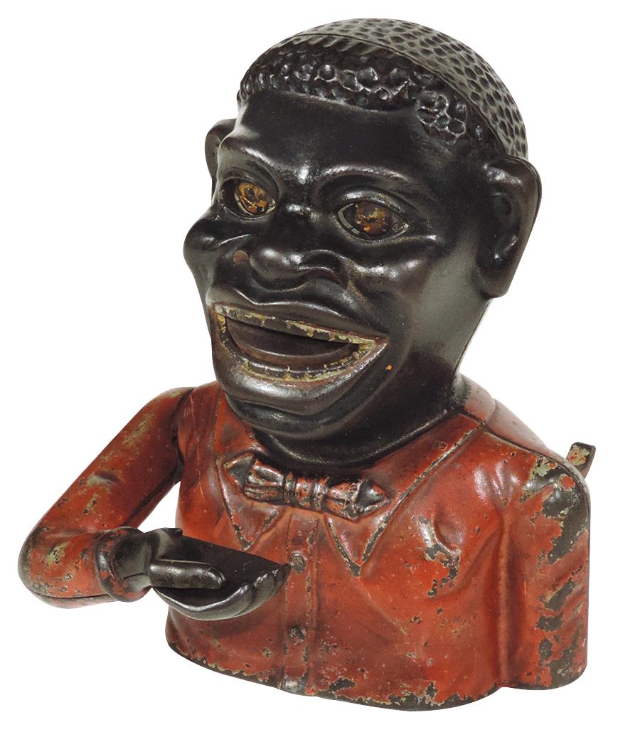 Mechanical Bank, Jolly "N", cast iron, mfgd by J. & E.: Mechanical Bank, Jolly "N", cast iron, mfgd by J. & E. Stevens, c.1896, lever raises coin to mouth while eyes roll back, VG orig working cond, 7"H.