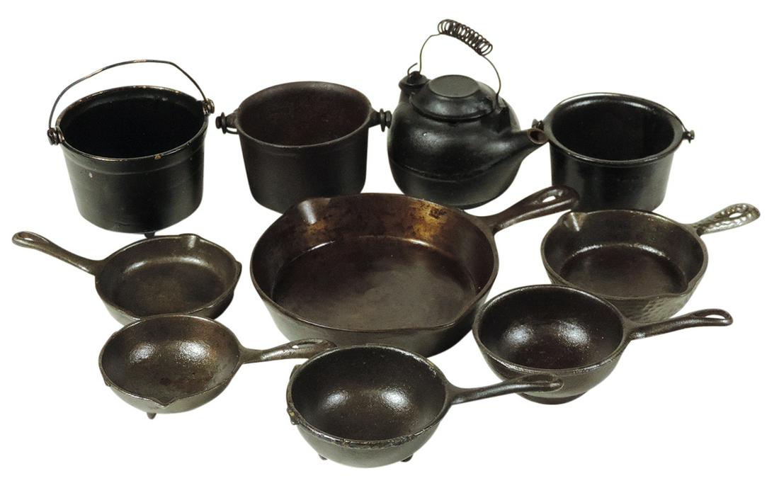 Toy Stove Utensils (10), all cast iron, tea kettle,: Toy Stove Utensils (10), all cast iron, tea kettle, bail-handled pot & skillets, hammered finish skillet w/"The Covered Wagon" Steakhouse decal & Wagner Ware size 0, VG cond, largest 4.5"Dia.