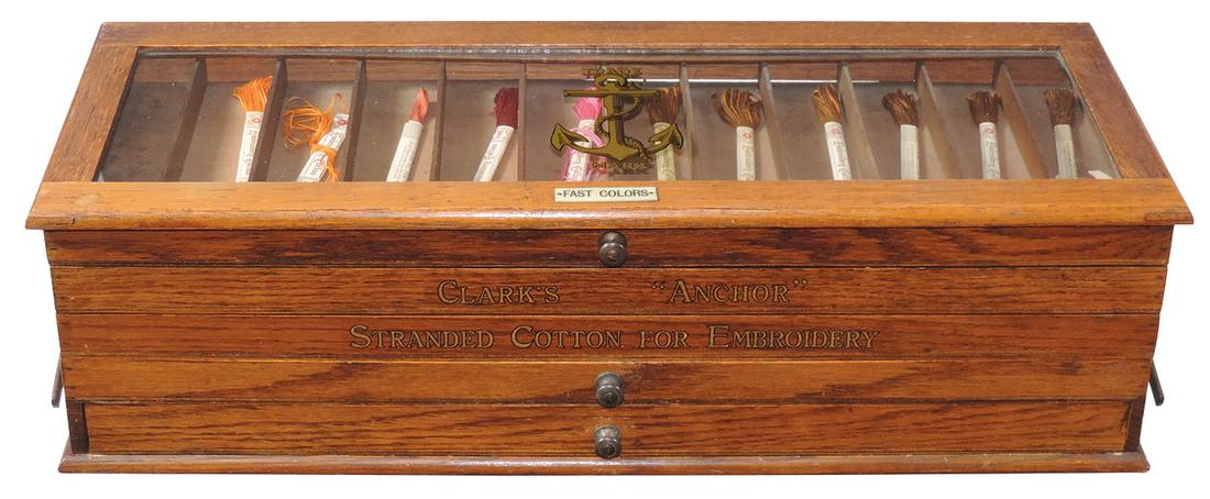 Country Store Clarks Anchor Embroidery Thread Cabinet,: Country Store Clark's Anchor Embroidery Thread Cabinet, 4-section stacking accordion fold w/lower drawer, gilt lettering & gold Anchor decal on glazed top, ea section w/dividers, Exc cond w/orig finis