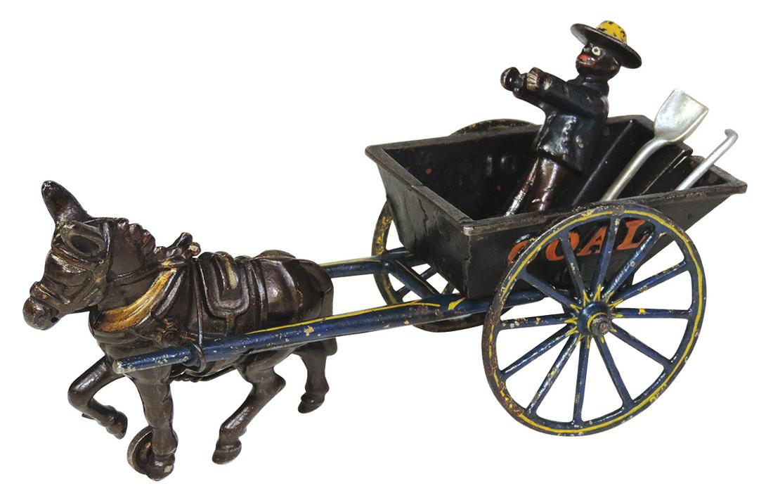 Toy Coal Dump Cart, mfgd by Ives, cast iron mule-driven: Toy Coal Dump Cart, mfgd by Ives, cast iron mule-driven cart w/standing Black driver, Exc cond w/great paint & pin-striping, 6"H x 10"L.
