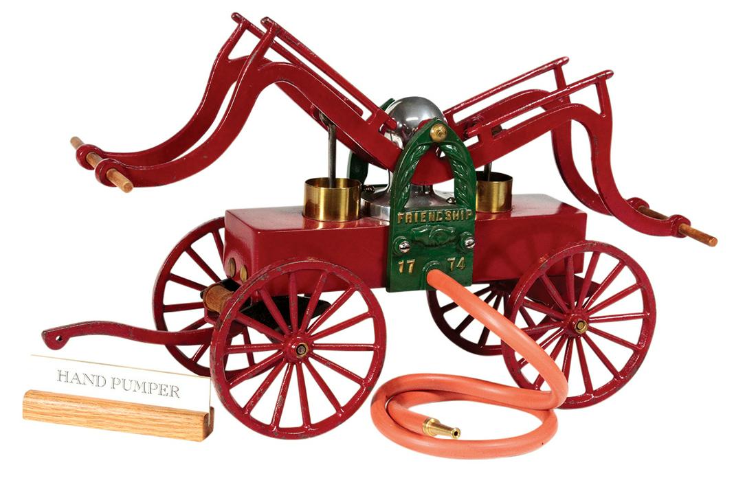 Toy Fire Pumper, "Friendship 1774", cast iron, mfgd by: Toy Fire Pumper, "Friendship 1774", cast iron, mfgd by Clark Ship Model Co.-Philadelphia, c.1930, polychrome paint w/wood handles, nickel-plated & brass fittings, VG to Exc cond w/paint chips mostly o