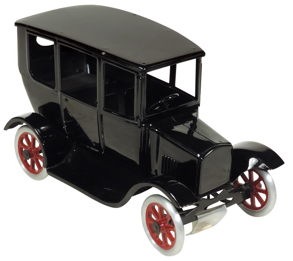 Toy Sedan, Buddy L Ford Center Door Flivver, pressed: Toy Sedan, Buddy L Ford Center Door Flivver, pressed steel, mfgd by Cowdery Toy Works, contemporary, Serial #077 w/matching number lapel pin, Exc+ cond, 11.25"L.