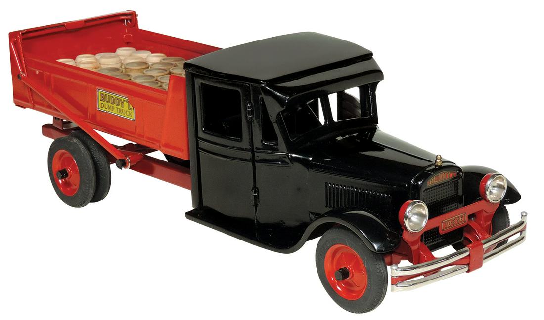 Toy Truck, Buddy L Jr. Dump Truck Model #2001, pressed: Toy Truck, Buddy L Jr. Dump Truck Model #2001, pressed steel, mfgd by Moline Pressed Steel Co., c.1930, Exc+ prof restored cond w/operating doors, tilt bed, swing gate & later miniature cargo display,