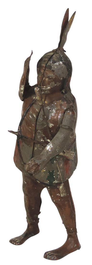 Toy Indian, Rare, mfgd by Gunthermann-Germany,: Toy Indian, Rare, mfgd by Gunthermann-Germany, hand-painted tin figure w/cast lead feet & bow & arrow in hand, late 19th C., clockwork activated, Good to VG working cond w/better than 50% orig paint,