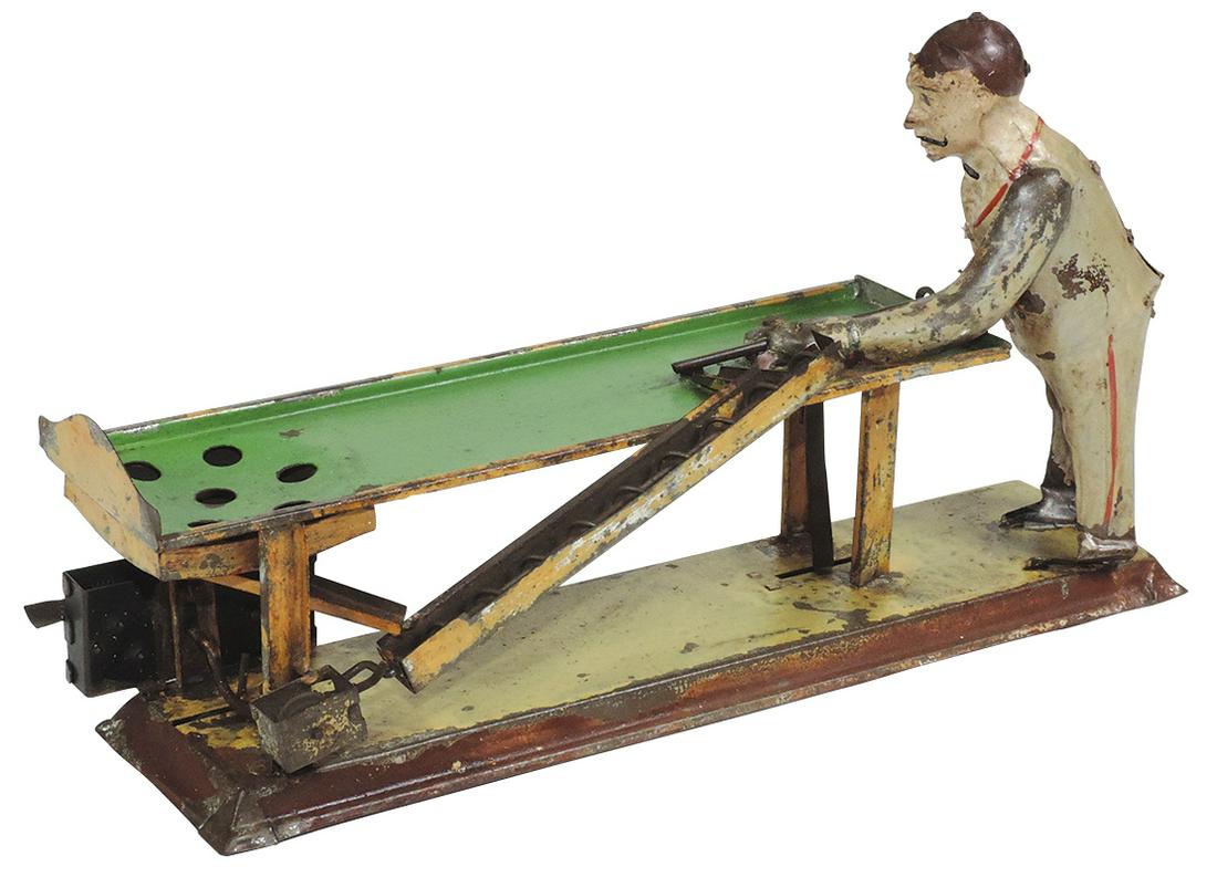 Toy Pool Player, hand-painted tin windup, mfgd by: Toy Pool Player, hand-painted tin windup, mfgd by Gunthermann-Germany, c.1900 w/clockwork drive & automatic ball return, Good working cond w/paint loss & balls absent, 11"L.