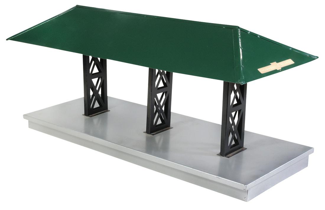 Toy Train, Buddy L Freight/Passenger Loading Platform,: Toy Train, Buddy L Freight/Passenger Loading Platform, pressed steel, mfgd by T-Reproductions w/signage for "Thomasville Station", VG cond, 14"H x 33"W x 12"D.