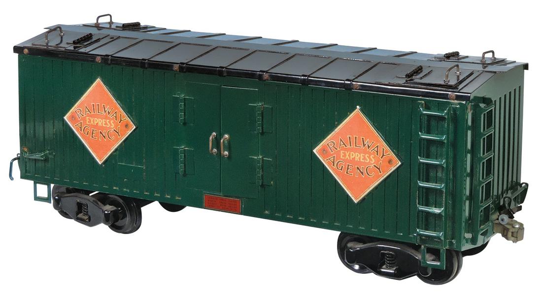 Toy Train, Buddy L Railway Express, pressed steel: Toy Train, Buddy L Railway Express, pressed steel w/working top hatches, mfgd by T-Reproductions, VG+ cond w/some signs of use, 22"L.