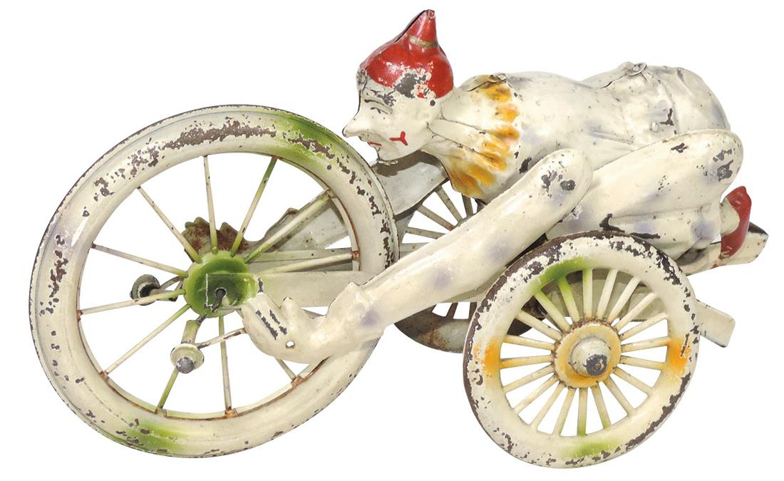 Toy Velocipede w/Clown, German, painted tin squeeze: Toy Velocipede w/Clown, German, painted tin squeeze windup, c.1890s, VG working cond w/some scattered wear, 10.5"L.