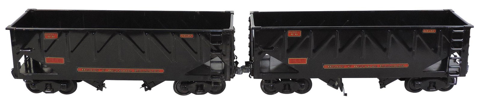Toy Train, Buddy L Outdoor Freight Cars (2), pressed: Toy Train, Buddy L Outdoor Freight Cars (2), pressed steel, mfgd by T-Reproductions, both bottom dump hoppers & numbered 68502, VG to Exc cond w/some edge rubbing, one w/broken coupler, ea 22"L.