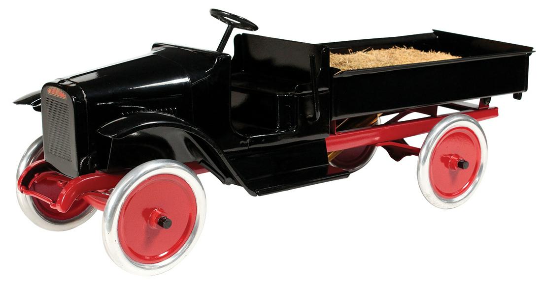 Toy Truck, Buddy L Hydraulic Dump, pressed steel, mfgd: Toy Truck, Buddy L Hydraulic Dump, pressed steel, mfgd by Moline Pressed Steel Co., c.1927, open cab w/polished steel wheels, Exc prof restored cond noting few chips on bed rail, 24"L.