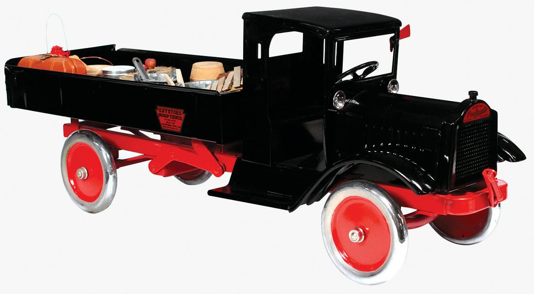 Toy Truck, Keystone Packard Dump Truck, pressed steel,: Toy Truck, Keystone Packard Dump Truck, pressed steel, c.1928, w/front crank operating dump bed, includes later miniature accessories for display, Exc prof restored cond noting some storage oxidation 