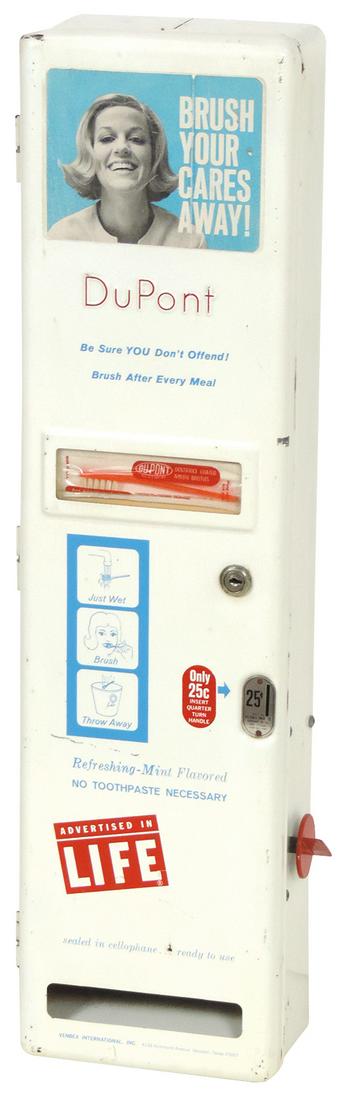 Coin-Operated DuPont Brush Your Cares Away 25 Cent: Coin-Operated DuPont Brush Your Cares Away 25 Cent Toothbrush Vendor, pressed & embossed steel wall mount, mfgd by Vendex International, c.1965, Exc orig cond w/graphics & product window, includes key
