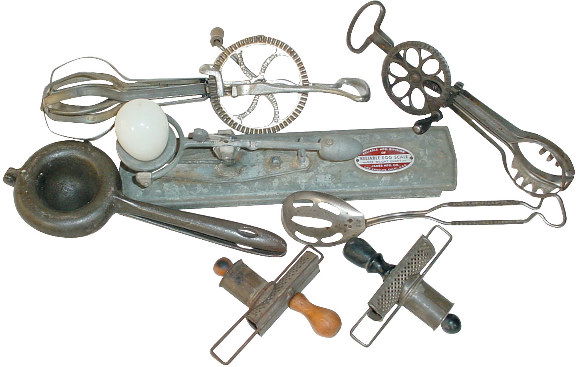 Kitchenware (7 pcs.); Taplin & Holt's eggbeaters, Re: Kitchenware (7 pcs.); Taplin & Holt's eggbeaters, Reliable egg scale, lemon squeezer, 2 nutmeg graters & slotted spoon from Harding Cream Co.-Omaha, all VG condition.