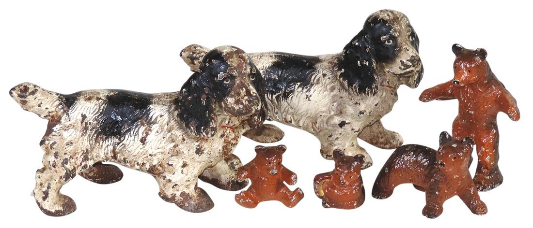 Doorstops & Paperweights (6), cast iron, 2 Hubley: Doorstops & Paperweights (6), cast iron, 2 Hubley Spaniel Doorstops & a set of 4 Occupied Japan bear paperweights, VG/Exc cond, the first two w/some wear, largest 6.75"L.