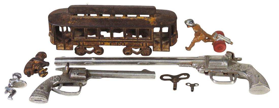 Toys (6), Stevens "Buffalo Bill" long barrel cap gun,: Toys (6), Stevens "Buffalo Bill" long barrel cap gun, Kenton cap gun, Kenton "R. T. Co" cast iron trolley, Maniol machine gunner & 2 cast iron drivers, VG to Exc cond, largest 8.5"L.