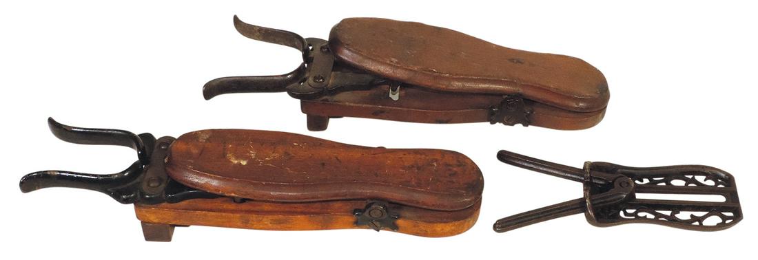 Bootjacks (3), Scarce Civil War period folding, cast iron & pair 19th C. mechanical wood & iron, VG+: Bootjacks (3), Scarce Civil War period folding, cast iron & pair 19th C. mechanical wood & iron, VG+ working cond w/1 mech missing spring, largest 15"L.