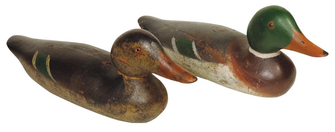 Decoys (2), carved & painted wood older Mallard Drake w/brass eyes & Hen w/glass eyes by different: Decoys (2), carved & painted wood older Mallard Drake w/brass eyes & Hen w/glass eyes by different makers, VG cond, 15.25"L.