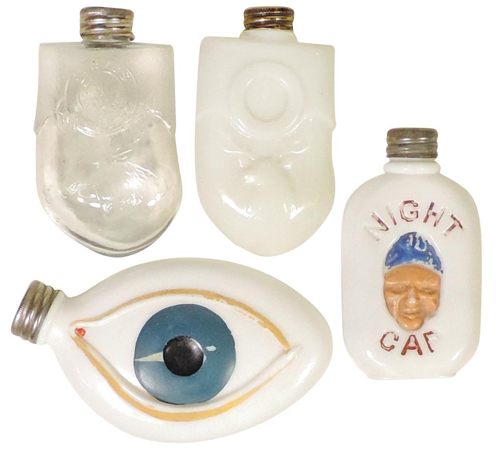 Breweriana Whiskey Flasks (4), M.G. embossed Eye Opener, Night Cap & pr of Elks Tooth flasks: Breweriana Whiskey Flasks (4), M.G. embossed Eye Opener, Night Cap & pr of Elks Tooth flasks embossed w/Elk's Lodge style logo in clear & milk glass, Exc cond, 3"H.
