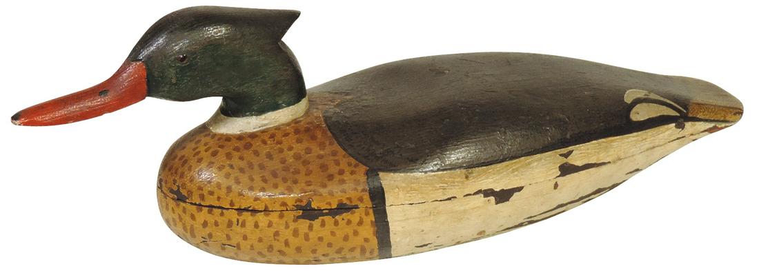 Decoy, Hooded Merganser, carved & early polychrome wood w/carved bill detail, glass eyes & single: Decoy, Hooded Merganser, carved & early polychrome wood w/carved bill detail, glass eyes & single point crest, likely Eastern Shore, VG cond w/some flaking to lower half, 17.25"L.