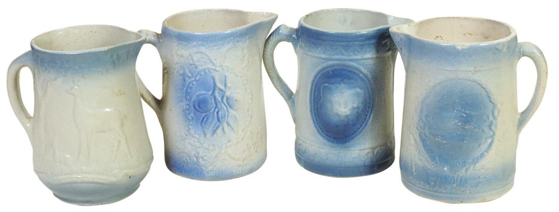 Stoneware (4), Blue & White Decorated Pitchers, all w/embossed scenes, running stag (chip on rim),: Stoneware (4), Blue & White Decorated Pitchers, all w/embossed scenes, running stag (chip on rim), cows, peaches & doe, Exc cond unless noted, largest 8.25"H.