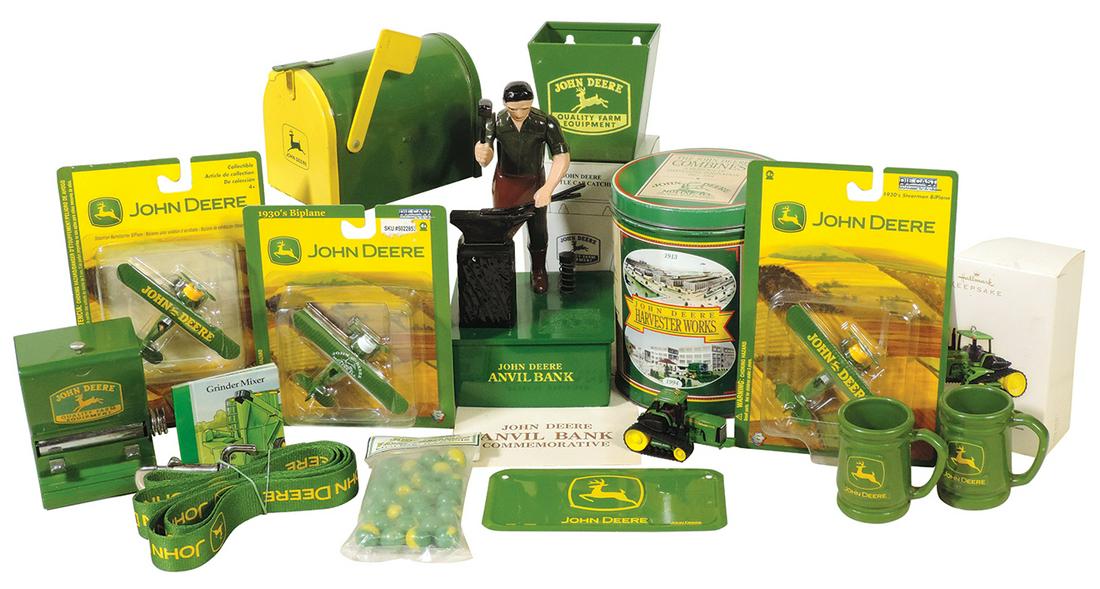 John Deere Toys & Memorabilia (15), Commemorative "Anvil" bank, mail box bank, toothpick dispenser,: John Deere Toys & Memorabilia (15), Commemorative "Anvil" bank, mail box bank, toothpick dispenser, 3 Mint in Box airplanes, bottle cap catcher, 9420T Hallmark ornament, dog leash & other items, Exc t