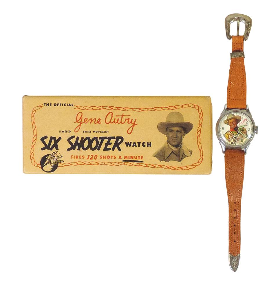 Western Character Gene Autry Watch, Six Shooter-fires 120 shots a minute, Swiss movement w/animated: Western Character Gene Autry Watch, Six Shooter-fires 120 shots a minute, Swiss movement w/animated pistol, Near Mint working cond in orig box, 6"L.