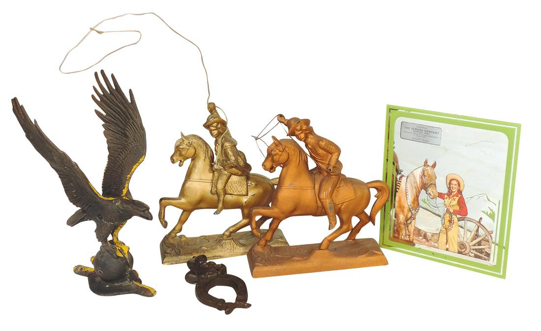 Western Figures (5), 2 cast metal Buffalo Bill figures, cast iron Cowboy bottle opener, reverse: Western Figures (5), 2 cast metal Buffalo Bill figures, cast iron Cowboy bottle opener, reverse mirror w/cowgirl adv Vernon Co. & later cast iron Eagle, VG cond, largest 11.5"H.