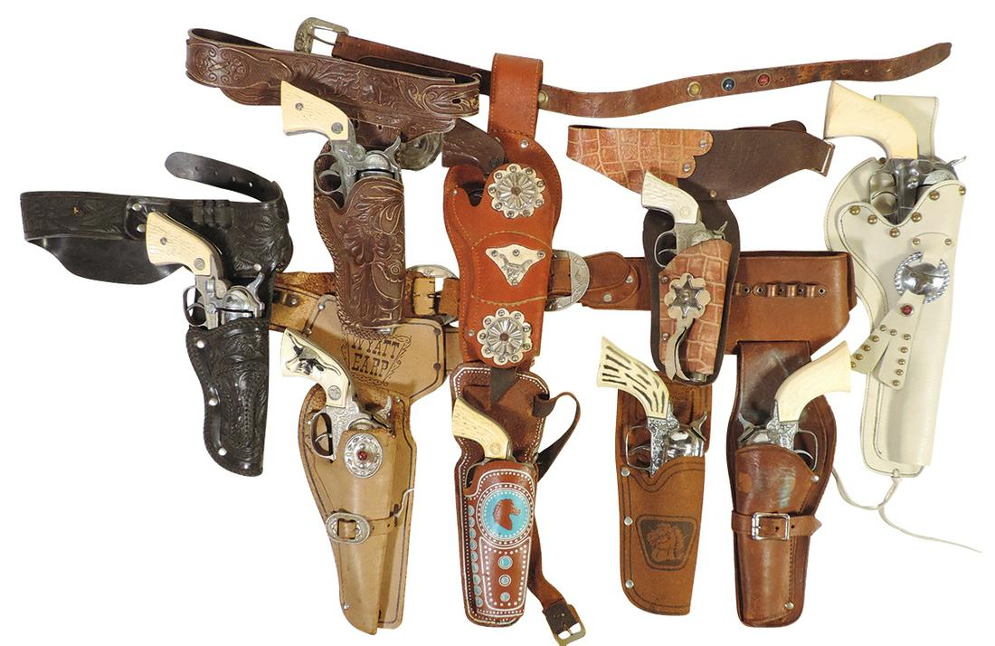 Western Character Cap Guns & Holsters (18), all single sets with & w/o belts, matched Colt 45 /white: Western Character Cap Guns & Holsters (18), all single sets with & w/o belts, matched Colt 45 w/white leather holster & others, Stallion 38, Hubley & Daisy in associated holsters, most VG cond.