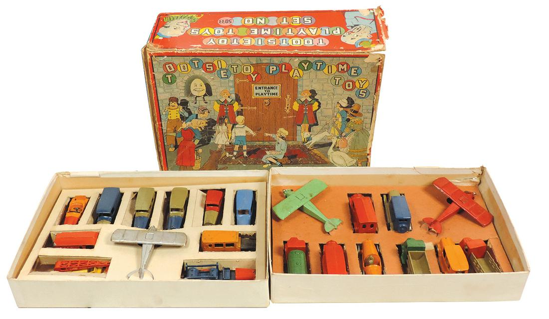 Toy Automobiles, die-cast boxed set No. 5033, mfgd by Tootsietoy, containing 21 assorted vehicles,: Toy Automobiles, die-cast boxed set No. 5033, mfgd by Tootsietoy, containing 21 assorted vehicles, cars, trucks & airplanes in orig box w/colorful graphics, Exc cond w/wear & losses to box.