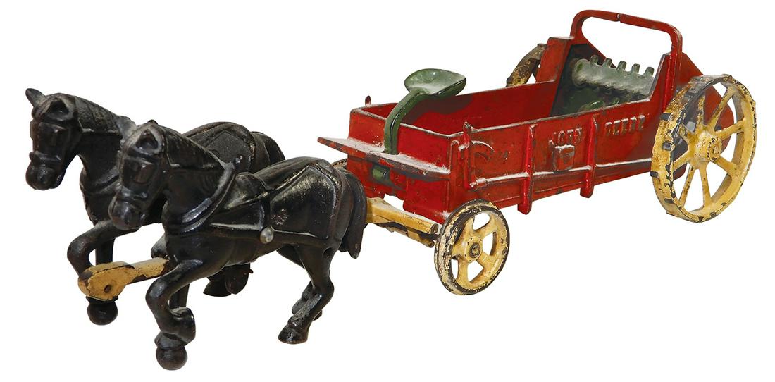 Toy John Deere Manure Spreader, cast iron, mfgd by Vindex w/complete w/2-horse team seldom found,: Toy John Deere Manure Spreader, cast iron, mfgd by Vindex w/complete w/2-horse team seldom found, VG working cond w/orig paint, worn mostly at wheels, 14.5"L.