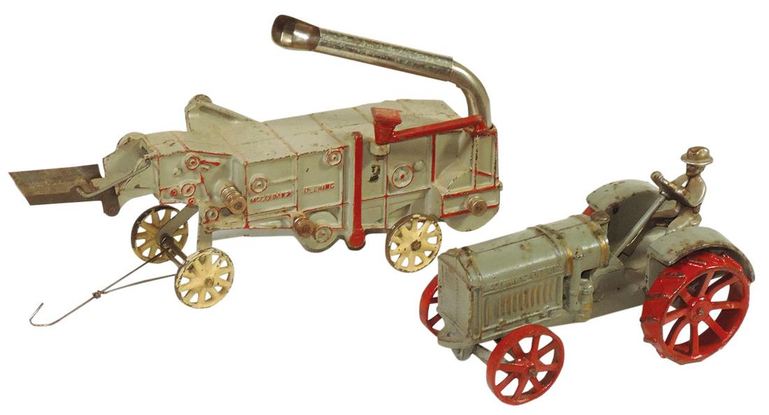 Toy Arcade McCormick Deering 10-20 Tractor & Threshing Machine, tractor gray w/red wheels, c.1925,: Toy Arcade McCormick Deering 10-20 Tractor & Threshing Machine, tractor gray w/red wheels, c.1925, both VG cond w/worn paint, 7" & 10.5"L.