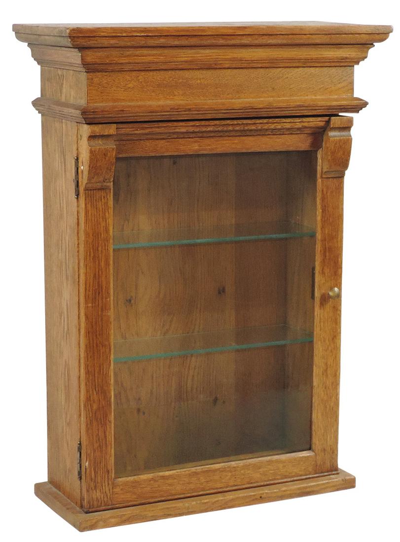 Counter or Wall Display Case, oak w/nice top & upper door moldings, side lock & glass shelves, a: Counter or Wall Display Case, oak w/nice top & upper door moldings, side lock & glass shelves, a high quality case in Exc cond w/key, 28"H x 20"W.