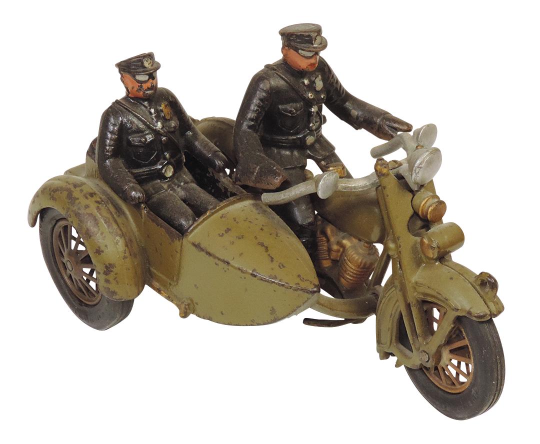 Toy Harley Davidson motorcycle cop & sidecar, cast iron, mfgd by Hubley, removable riders, VG+ cond: Toy Harley Davidson motorcycle cop & sidecar, cast iron, mfgd by Hubley, removable riders, VG+ cond w/working clacker, orig paint & decals, noting front rubber replaced, 9"L.