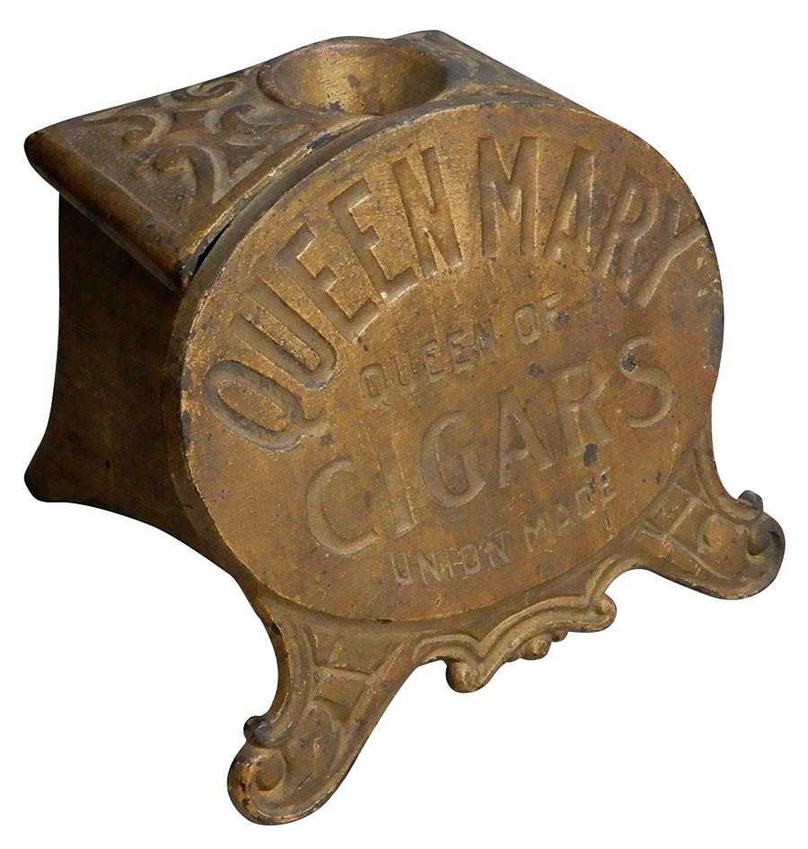 Cigar Cutter, Queen Mary Cigars, mfgd by Brunhoff-Cinc, O., cast iron automatic windup, has old gold: Cigar Cutter, Queen Mary Cigars, mfgd by Brunhoff-Cinc, O., cast iron automatic windup, has old gold painted surface, c.1900, VG orig working cond, 5.5"H x 6.5"W x 6"D.
