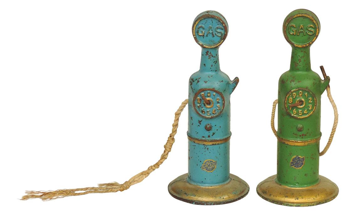 Toy Gas Pumps (2), cast iron by Arcade, VG cond w/one missing nozzle, 6"H.: Toy Gas Pumps (2), cast iron by Arcade, VG cond w/one missing nozzle, 6"H.